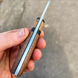 Drop point hunting knife